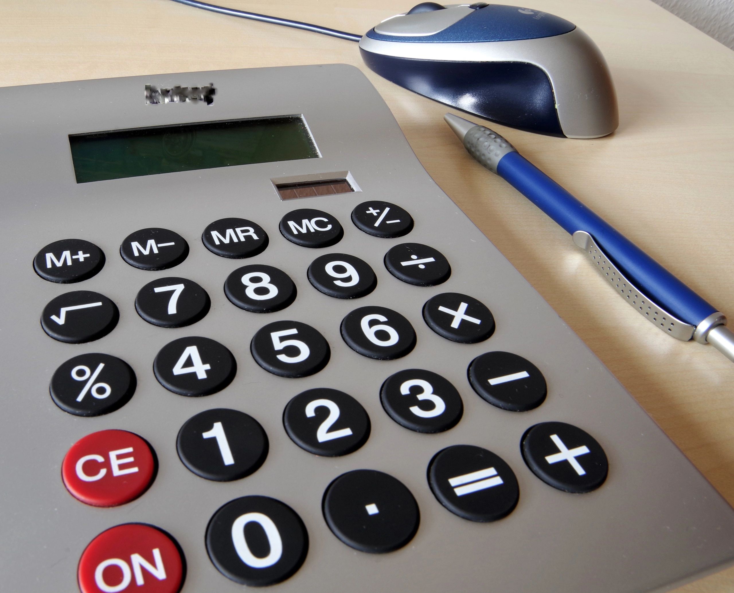 Calculator and desk tools representing accounts payable